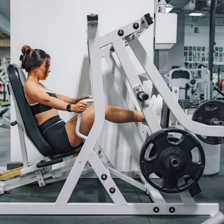 Interior of a professional gym with weight training equipment and mirrors